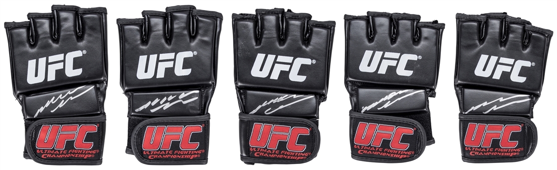 Lot of (5) Anderson Silva Signed UFC Grappling Glove (PSA/DNA)